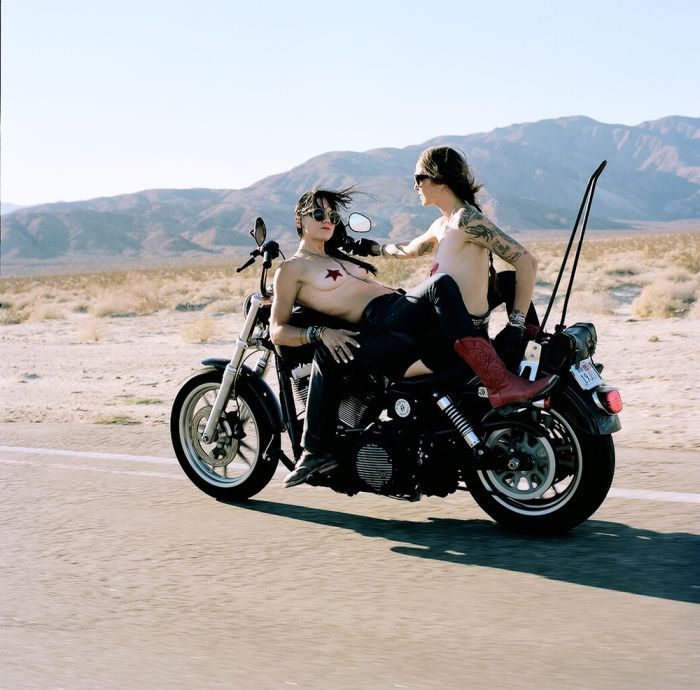 Girls on a motorcycle in Yushu